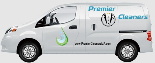 White van with "Premier Cleaners" logo, tuxedo design, and website link on the side. Green and blue decorative icon next to the door.